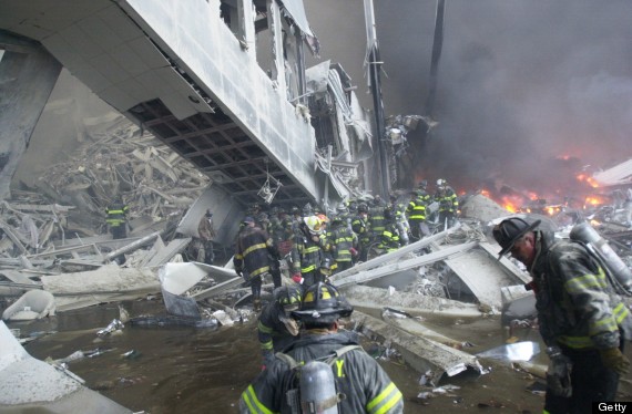 Firefighters Look For Survivors In The Rubble