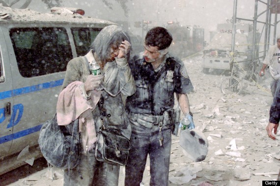 Police officer Mike Brennan helps a distraught woman known o